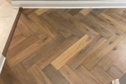 French Oak flooring installed in the herringbone pattern.