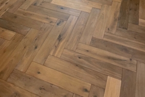 French Oak flooring installed in herringbone pattern.