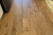 Installing Oak flooring.