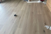 Installing French Oak flooring.