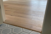 Installing French Oak flooring.