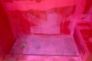 Red Guard waterproofing, installed in the shower area.