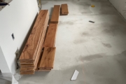 Hickory planks on leveled subfloor.