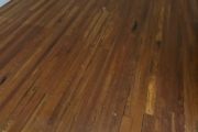 Old Heart Pine wood flooring, prior to refinishing.