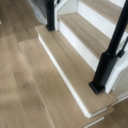 New Oak stair treads installed and match stained bottom treads.