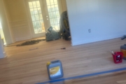 Sanding Red Oak flooring.