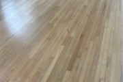 Sanding Red Oak flooring.