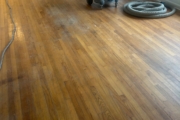 Sanding Red Oak flooring.