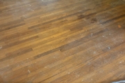 Sanding Red Oak flooring.