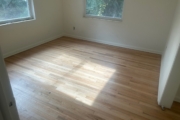 Sanding Red Oak flooring.