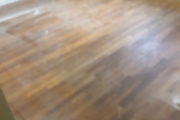 Sanding Red Oak flooring.