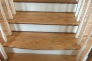 Finished wood flooring and stairs.