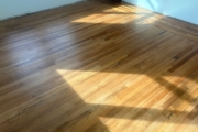 Repaired and refinished wooden floors.