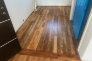 Repaired and refinished wooden floors.