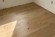 Installed White Oak hardwood flooring.