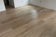 Installed White Oak hardwood flooring.