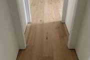 Installed White Oak hardwood flooring.