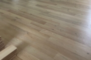 Installed White Oak hardwood flooring.