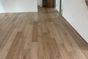 Installed White Oak hardwood flooring.