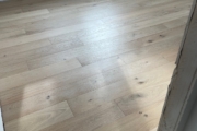 Installed White Oak hardwood flooring.