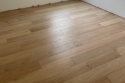 Installed White Oak hardwood flooring.