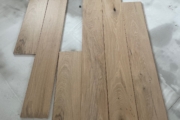 Installing White Oak hardwood flooring.