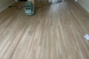 Sanding White Oak flooring.