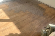 Wooden floors being sanded.