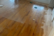 Sanding wood flooring and stair treads.