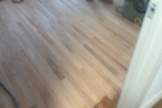 Sanding wood flooring and stair treads.