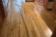 Sanding White Oak flooring.