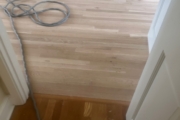 Sanding White Oak flooring.