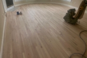 Sanding White Oak flooring.