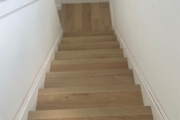 White Oak hardwood flooring treads and new nosing installed.