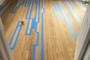 Stained wood flooring weave-in.