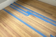 Stained wood flooring weave-in.