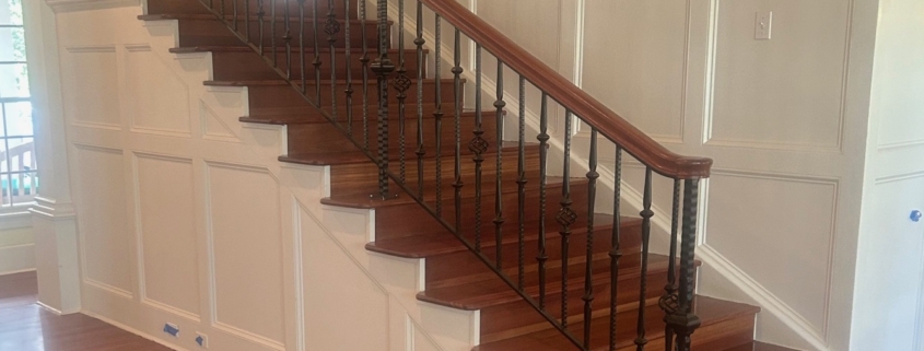 Refinished Brazilian Cherry wood floors and stairway.