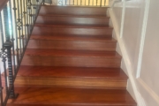 Refinished Brazilian Cherry wood floors and stairway.