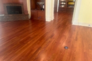 Refinished Brazilian Cherry wood floors and stairway.