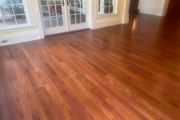 Refinished Brazilian Cherry wood floors and stairway.