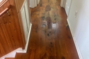 Oak flooring before sanding and recoating.