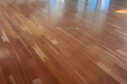 Cupped solid American Cherry wood flooring.