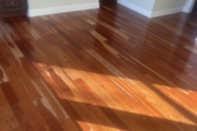 Cupped solid American Cherry wood flooring.