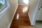 Cupped solid American Cherry wood flooring.