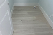 Installed Luxury Vinyl Plank flooring.