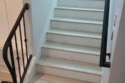 Luxury Vinyl Plank flooring installed on stairs.