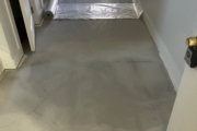 Leveling concrete slab subfloor.