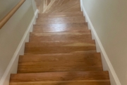 Refinished American Cherry stair treads.