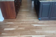 Refinished solid American Cherry wood floors.