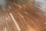 Refinished solid American Cherry wood floors.